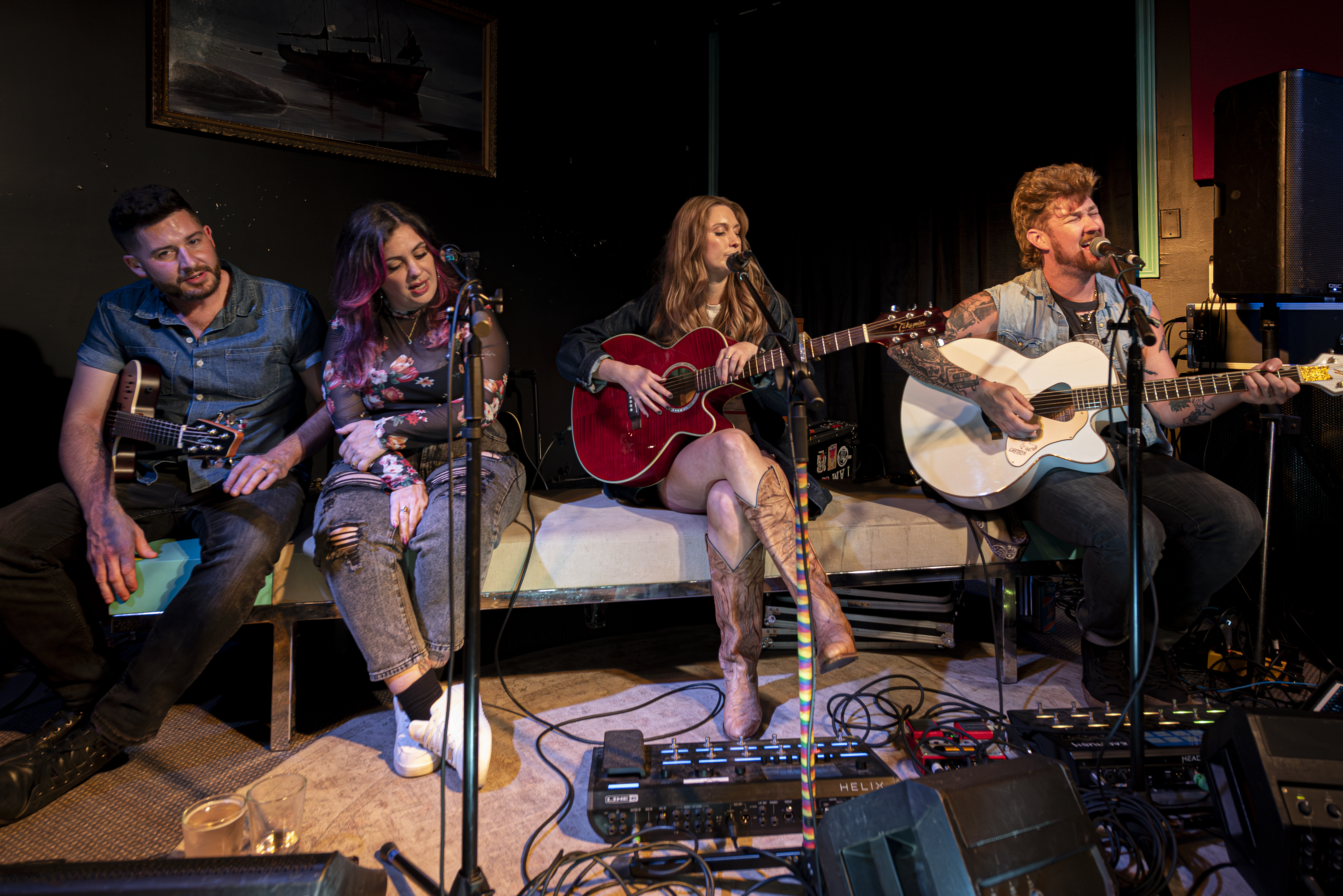 Acoustic musicians performing at a gathering in Antigonish
